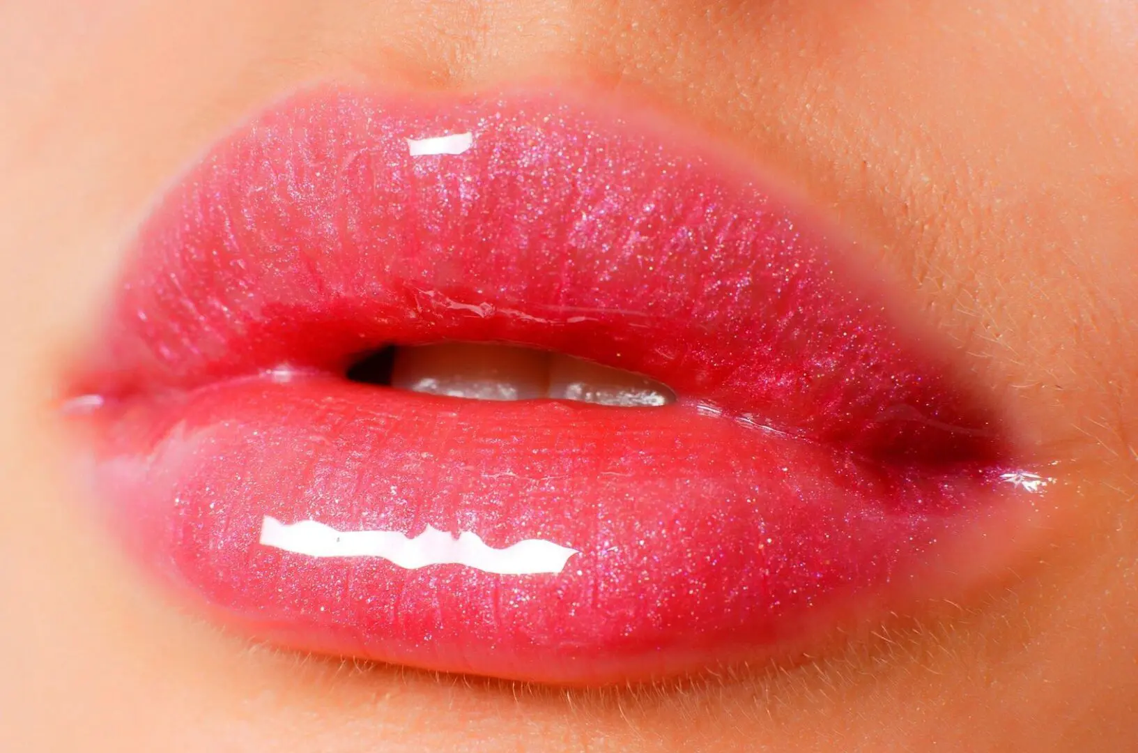 A close up of the lips and tongue of a woman